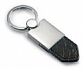 Key holder with shiny metal finish and PU crocodile style leathe
