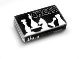 Chess game in a silver tin box with thirty two game figures. - A