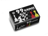 Chequers, ludo and dice games in a silver tin box. The score pad