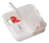 Square translucent plastic pill box with four compartments. - Av
