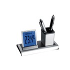 Innovative desk clock and pen pot which also displays day, date