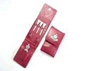 Carrol Boyes Golf Set- Cross Legged-Red Carrol Boyes Golf Set- Cross Legged-Red