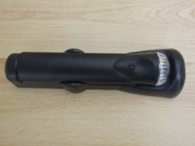 Black emergency torch with mounting bracket adhesive tap