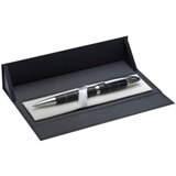 Black and silver ball pen in a triangle magnetic box.