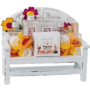 Wellness set, papaya fragrance on wooden bank