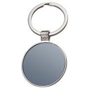 Metal key ring with black-mirror backround.