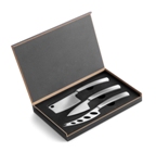 Set of three stainless steel knives presented in a black wooden