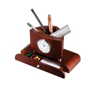 Wooden pen pot and clock with a small drawer.
