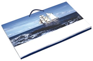 Wall planning calendar with standard pic of sailing ship, folded.